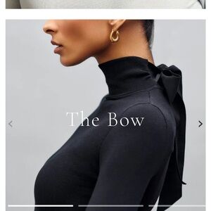 Elegant Black Turtleneck Sweater with Bow